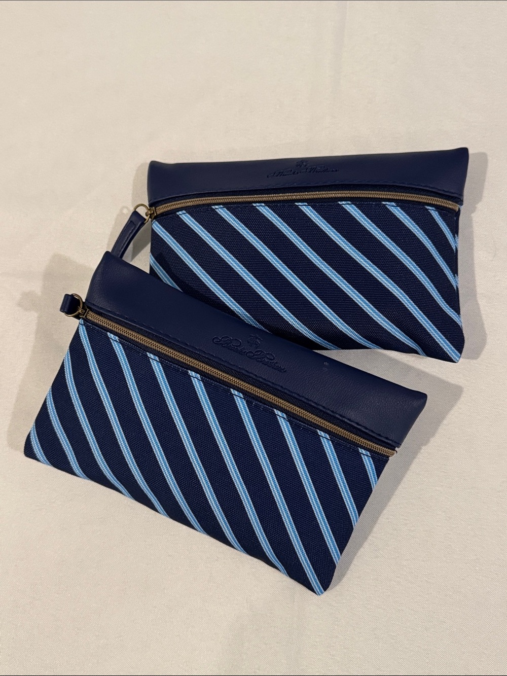 United Airlines Brooks Brothers Navy and Light Blue Striped Amenity Kit